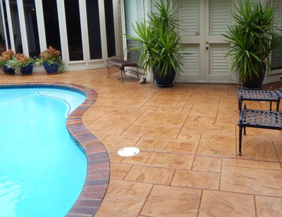 Residential pool with stamped concrete pool deck in Roanoke.