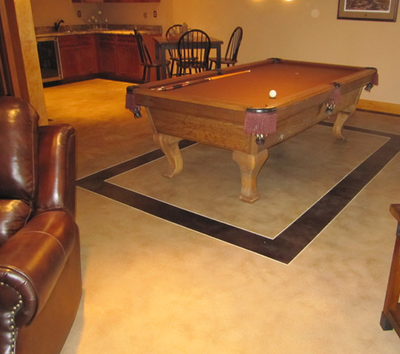 Home basement spruced up with pretty decorative concrete.