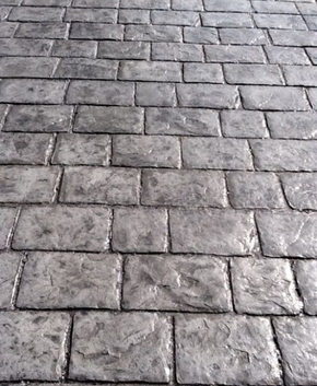 Concrete stamping made to look like old paver style bricks